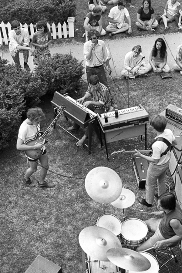 ANN ARBOR, MI - 1966: Drummer and student at the University of Michigan James Osterberg, Jr. (later known as Iggy Pop) performs with his band The Prime Movers in the front garden of a house on State Street in 1966 in Ann Arbor, Michigan. (Photo by Tom Copi/Michael Ochs Archives/Getty Images)